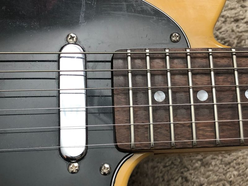 The merging of a Tele body with a Mustang neck.