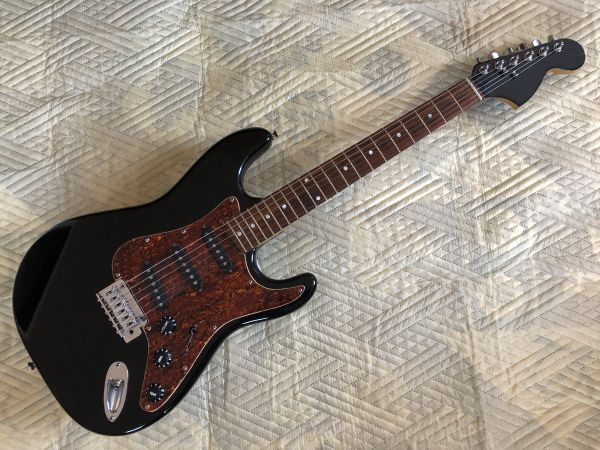 The Jag-O-phone. Half Squire Mustang and half Epiphone S310.