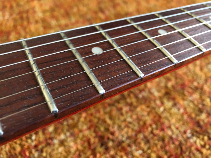 The very comfortable Jatoba (Brazilian Cherrywood) fretboard