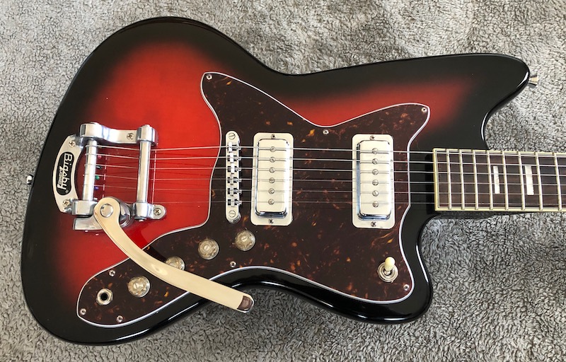 Samick's reissue of the Silvertone 1478 is much better than the original